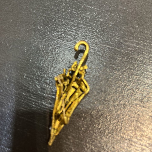 Umbrella-shaped brooch with purple crystals and antique gold metal like new
