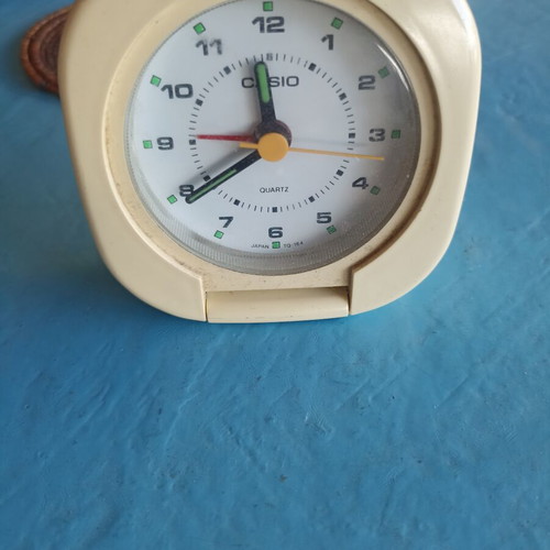 Casio portable alarm clock used, analog display