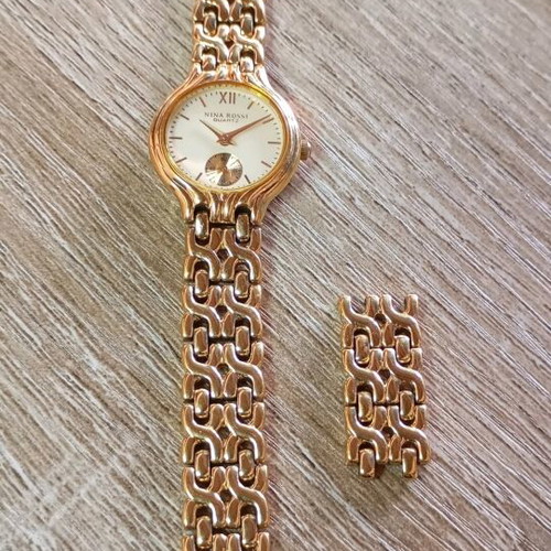 Nina Rossi wristwatch gold like new, women's