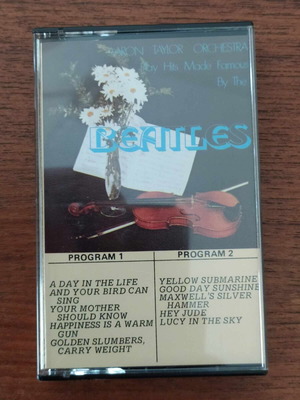 Cassette The Aaron Taylor Orchestra plays hits by the Beatles used, rock