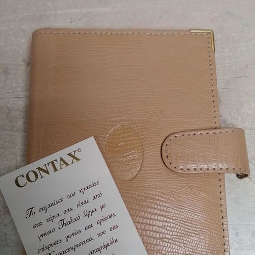 Leather organizer with sun damage