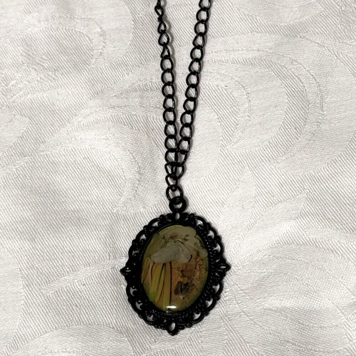 Vintage style necklace pendant with natural leaves sealed in resin, like new