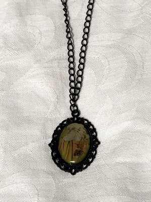 Vintage style necklace pendant with natural leaves sealed in resin, like new