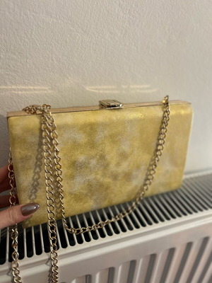 Clutch bag gold with chain like new