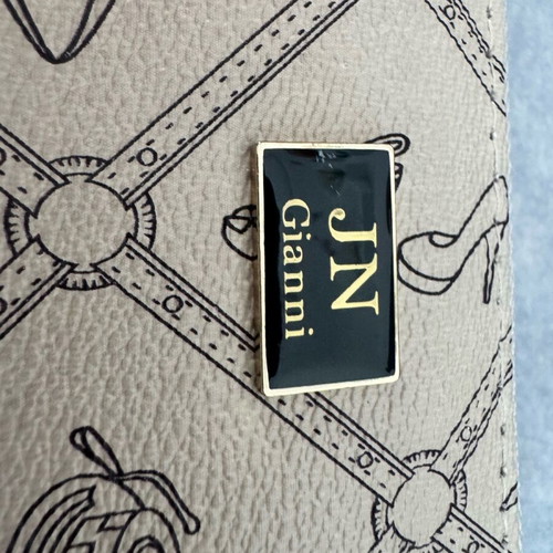 Beige wallet with designs like new