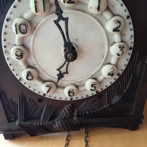 Vintage cuckoo clock used with pinecone weights