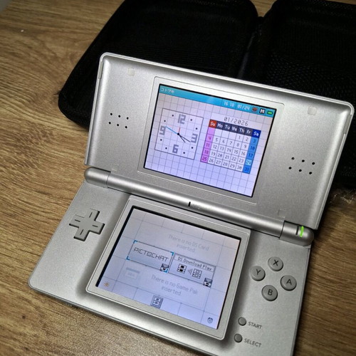 Nintendo DS Lite Silver like new with Super Mario Party game