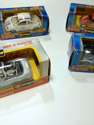Burago 4 toy cars 1:43 scale miniatures like new, in box