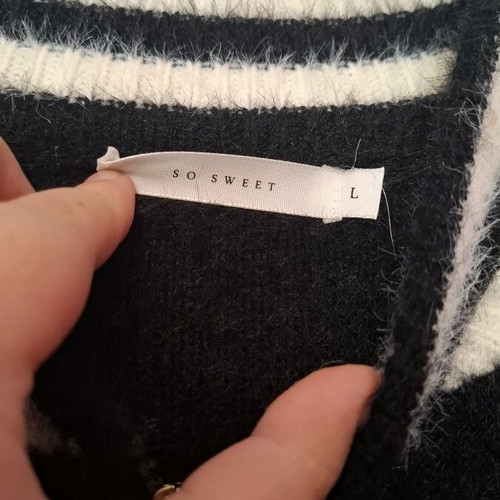Fuzzy cardigan with bees Large like new, black and white