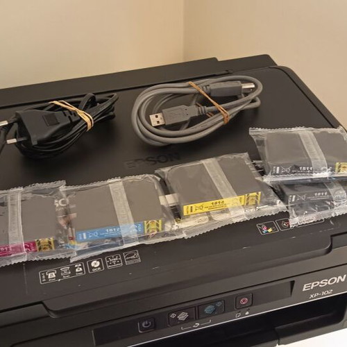 Epson XP-102 printer used with free ink cartridges