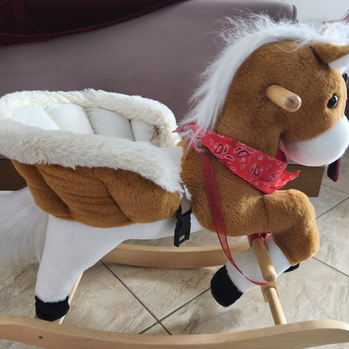 Rocking horse for children used with sounds