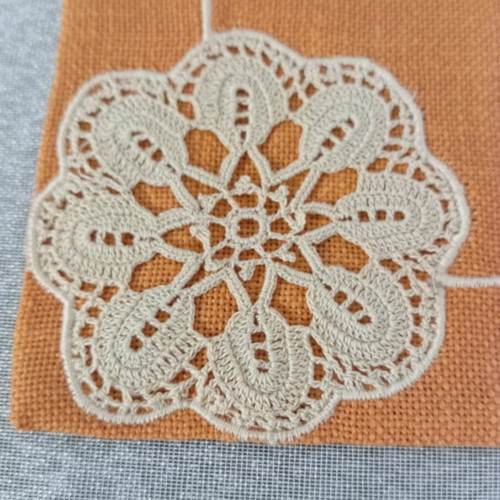Table linens with hand crochet design, new, set of 2 orange with beige