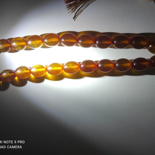 Mastic komboloi with orange shades, 33 beads