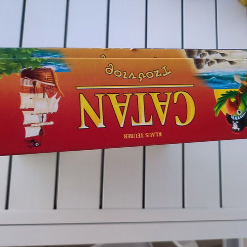 Catan Junior board game like new, missing one yellow pirate lair