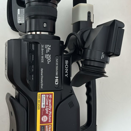 Sony HXR-MC2500 like new with large NP-F970 battery and external microphone