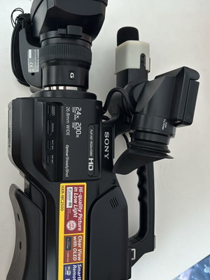 Sony HXR-MC2500 like new with large NP-F970 battery and external microphone