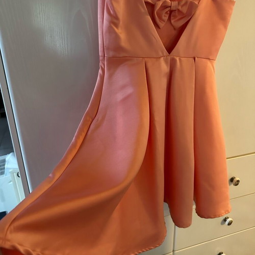 Peach dress like new size L with bow detail on back