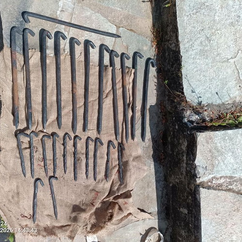 Tent pegs used, durable homemade design for stage support