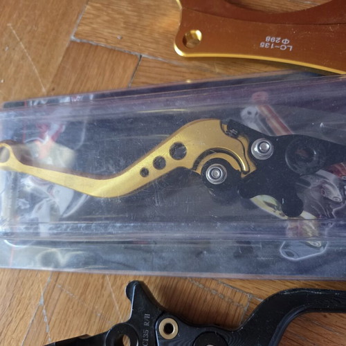 Brake and clutch levers like new, gold and black
