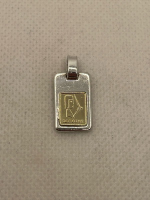 Silver and gold Sagittarius pendant used