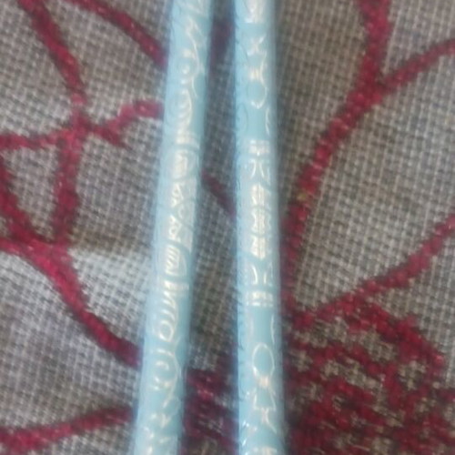 Set of 2 light blue pencils with designs