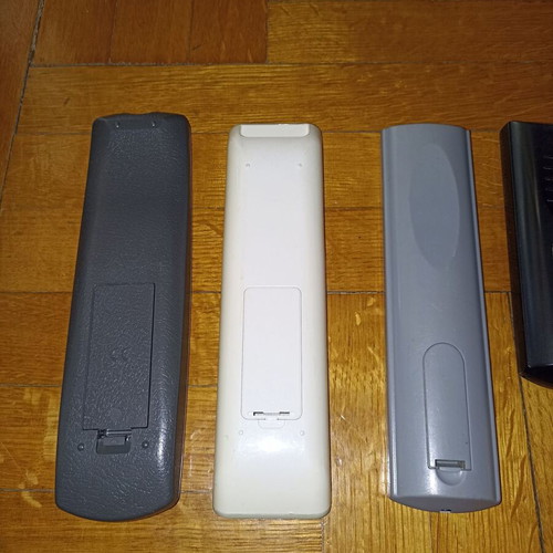 Set of 7 different TV remote controls