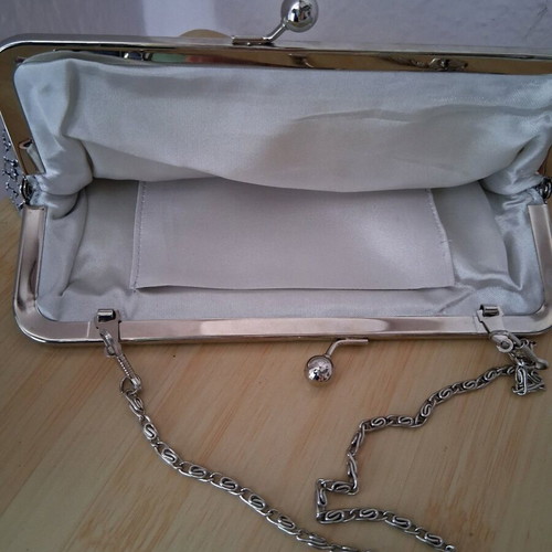 Small silver evening clutch bag used