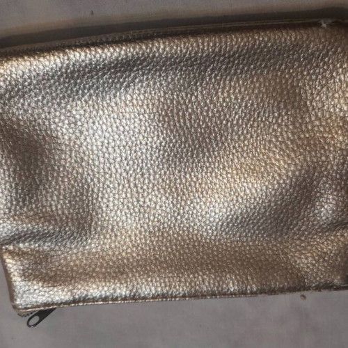 Gold toiletry bag for evening outings