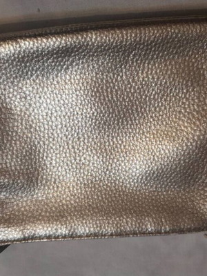 Gold toiletry bag for evening outings