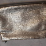 Gold toiletry bag for evening outings