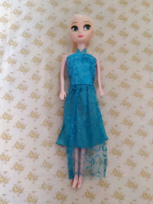 Doll 28 cm long in good condition