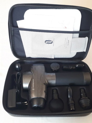 Tao Tronics TT-PCAA003 massage device used with 6 heads