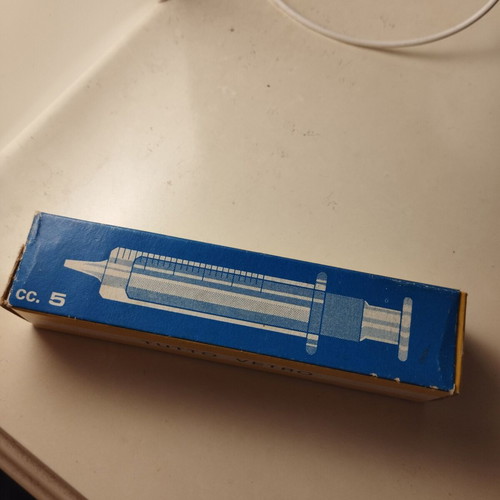 Vintage glass syringe in excellent condition in its box