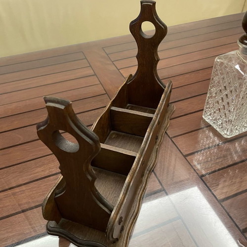 Vintage English decanters used in wooden stand for gin, cognac, whisky