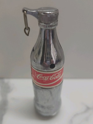 Collectible lighter used in Coca Cola bottle shape 90s