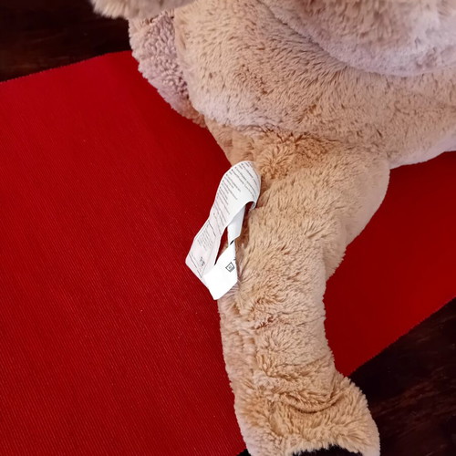 Large plush dog like new, soft beige 70x30 cm