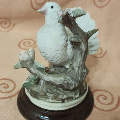 Vintage porcelain decorative figurine used