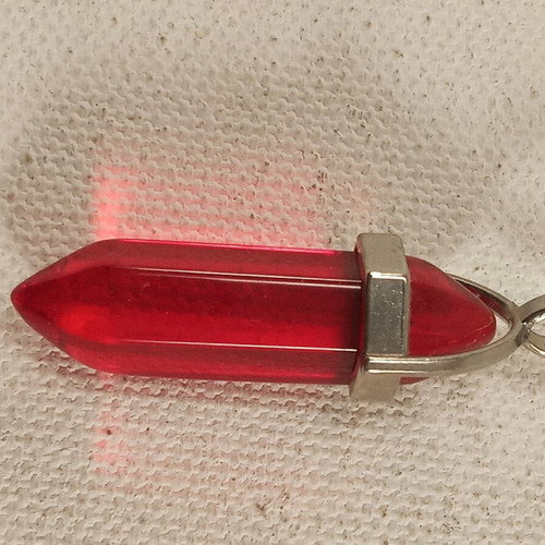 Metal pendant with red glass like new, 4.5 cm length