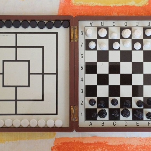 Magnetic travel chess and tic-tac-toe set used, ideal for travel