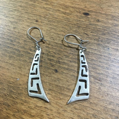 Silver earrings and silver owl ring