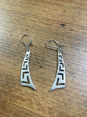 Silver earrings and silver owl ring
