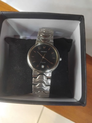 Orient unisex watch new, battery powered, gray and black