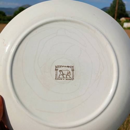 Decorative ceramic vintage plate used with 3 dogs design