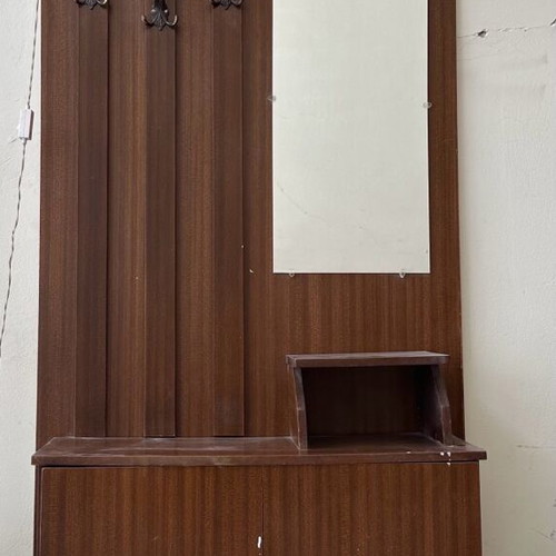 Vintage entrance furniture used with hooks, mirror and light