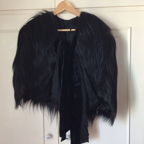 Vintage chimpanzee fur cape with satin lining and velvet ribbons