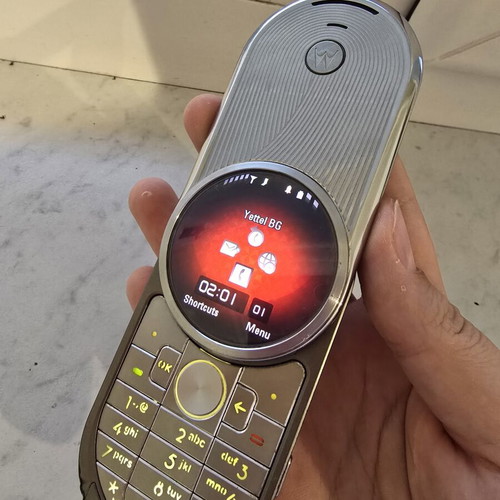 Motorola Aura R1 used, gray phone with smooth mechanism