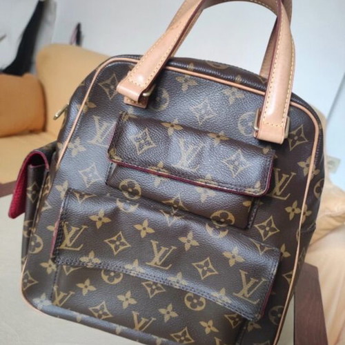 Louis Vuitton Monogram Excentri Cite handbag hand brown like new