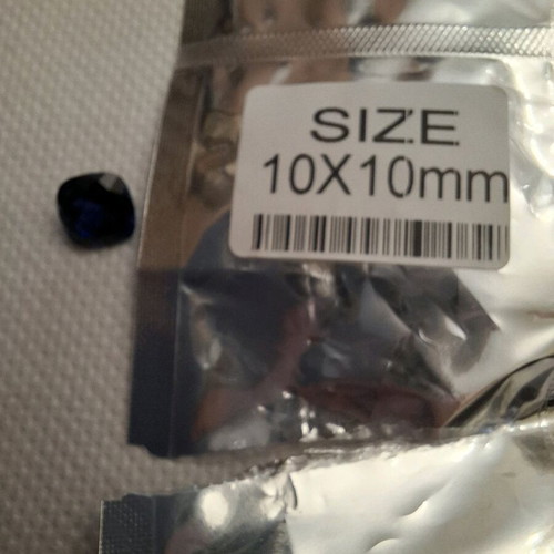 Artificial sapphire like new, dark blue, approx. 1cm x 1cm
