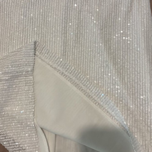 Strapless mini dress used, white with feathers