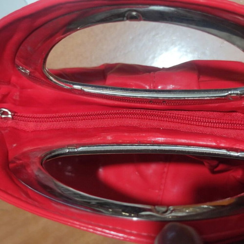Red handbag made of leatherette, like new